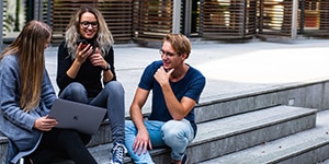 Photo of young adults chatting